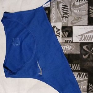 Nike Athletic Womens Tank top royal blue in color with black and white nikwsash